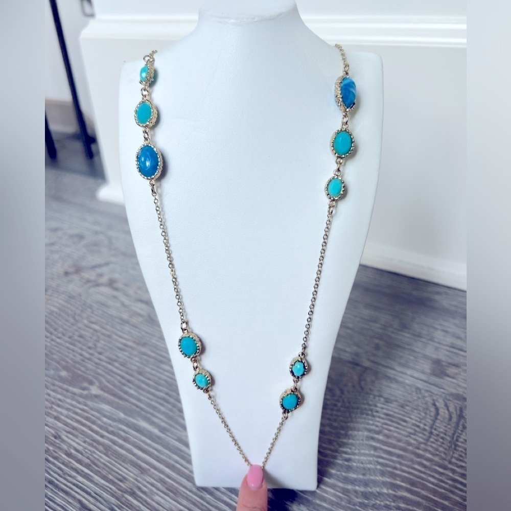 Long necklace with blue pendants